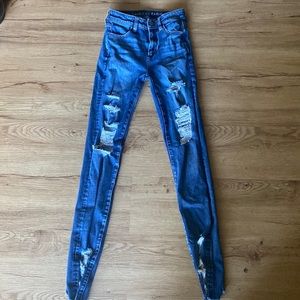 -AMERICAN EAGLE SUPER STRETCH RIPPED JEANS- Size 0 women’s